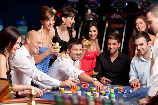 Group enjoying a lively casino atmosphere.